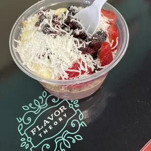 a bowl of fruit and cheese