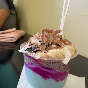 a smoothie in a plastic cup