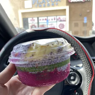 Pitaya base, matcha and taro chia pudding, granola, some fruits, goji berries, and MOST IMPORTANTLY, MULBERRIES