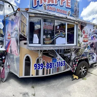a food truck parked in a parking lot