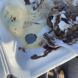 my daughter almost choked on this quarter this is very unsanitary i would like who ever did this fired!!!!