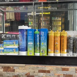 a variety of products displayed in a store window
