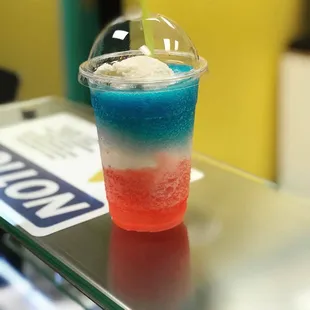 a red, white, and blue drink