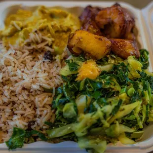 Curry Chicken, Coconut Rice, Platano and Greens; to die for!