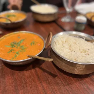 bowls of food on a wooden table