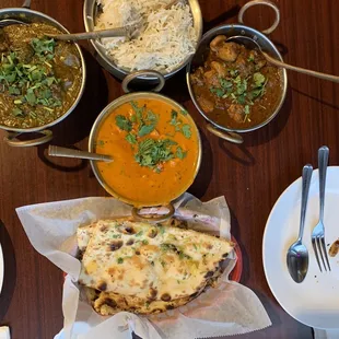 Rice, lamb saag, paneer masala, chicken curry, garlic naan