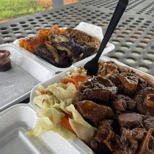 Oxtail Jamaican Rice and Peas Steamed Cabbage Jerk Chicken Mac and Cheese