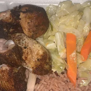 Jerk chicken small plate with delicious cabbage &amp; rice &amp; peas