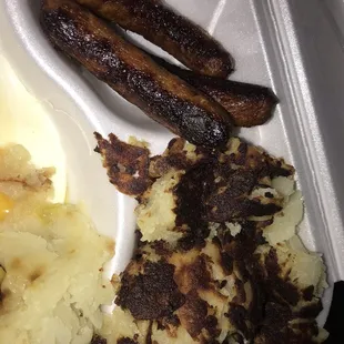 Burnt sausage and potatoes.