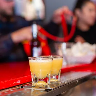a shot of a drink on the bar