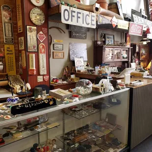 Time to check out?  Even this corner is interesting!  A wooden propeller on the shelf above?? Wow!