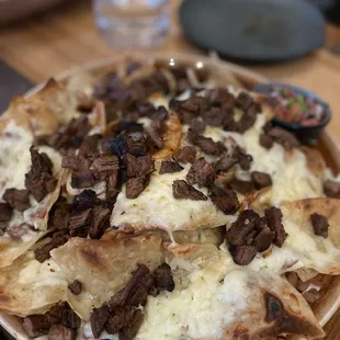 Carne asada nachos (toppings on the side)