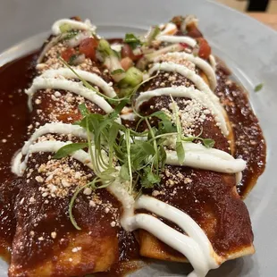 Carne asada enchiladas with salsa roja