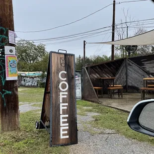 a sign for a coffee shop