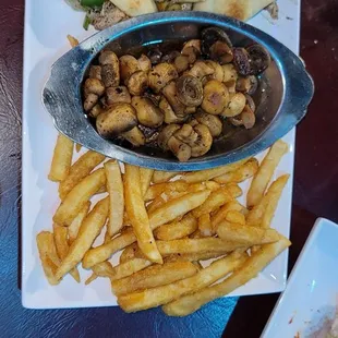 Full meal.. salmon philly sautéed mushrooms and fries