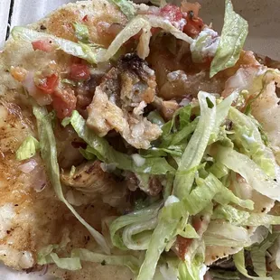 The total amount of fish in this super fish taco is the size of my pinky....cutting cost this way is just so disappointing