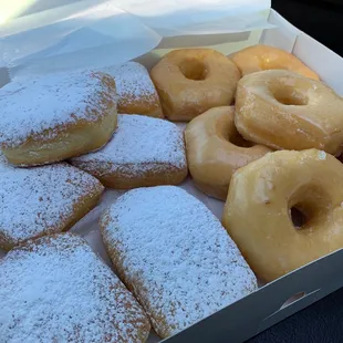 Ordered a dozen half beignet half glazed and got some extra lagniappe