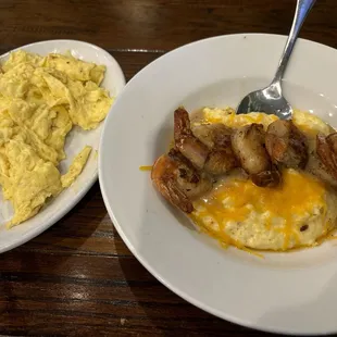 Shrimp and grits with a side of eggs.