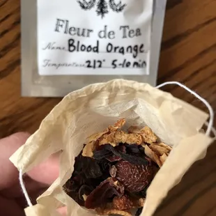 Blood Orange pre-bagged loose herbal tea from the Tea Sampler (online shop) -- also had rose hips and hibiscus flowers. Non-caffeinated!