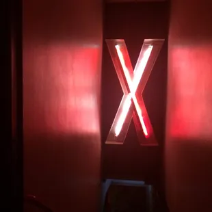 a red light coming through a window