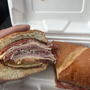 a sandwich in a styrofoam container