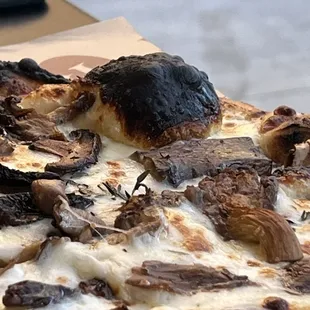 Semi burned pizza