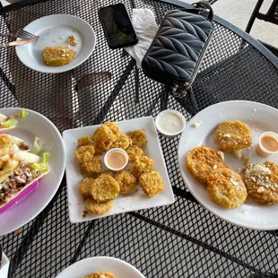Pork tacos, fried green tomatoes, and Fried Pickles. Delicious