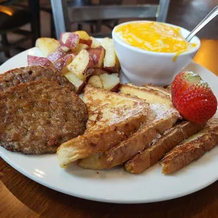 French toast, home fries, cheese grits, sausage patties.