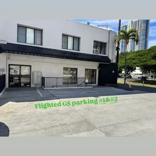 Behind the building , reserved parking for Flighted GS