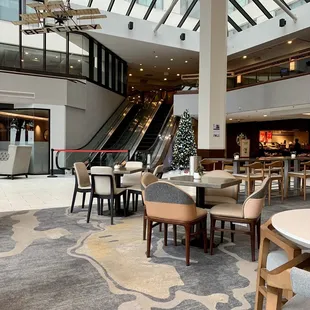 lounge area with escalators