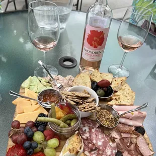 Combo charcuterie board and vinho verde rosé