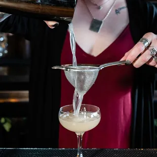 Poured to perfection. Cocktails expertly crafted at the bar.