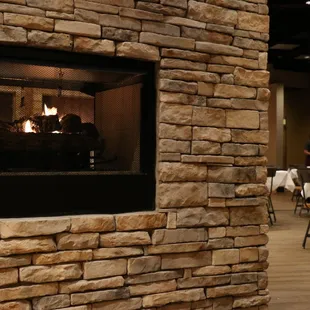 a fireplace in the dining room