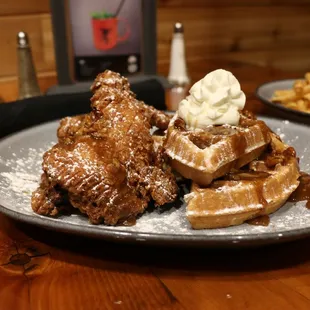 a plate of fried chicken and waffles