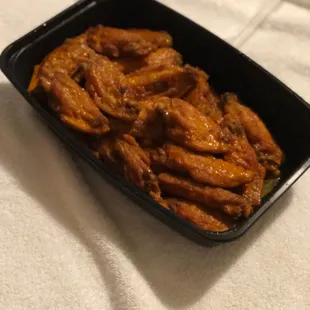shows a plate of chicken wings