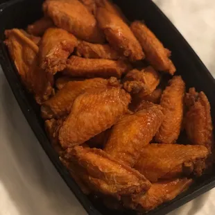 shows a tray of chicken wings