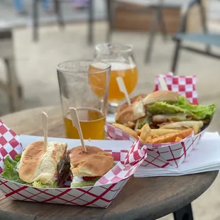 two sandwiches and a beer