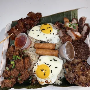 Mini Kamayan with added fried eggs and burger