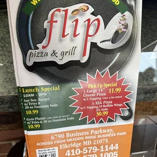 a sign for flip pizza and grill
