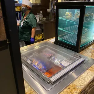 The "found money" jar is behind that lady... disgusting..