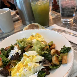 Veggie Bowl, no onion, PERFECTLY poached eggs. Green juice (SO SO GOOD)! I ate the whole thing!