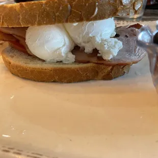 Sourdough bread bacon, ham and poached egg Sando.