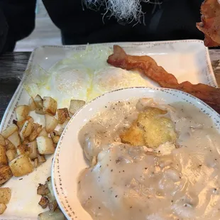 Biscuits and gravy plate. Hubby nearly licked the plate.