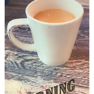 a cup of coffee with the words morning vibes on it