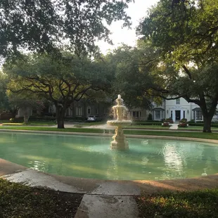 Gorgeous park with a gazebo and a fountain hidden within Highland Park