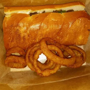 Philly cheese steak + beer battered onion rings
