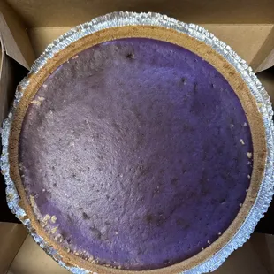 A whole UBE cheesecake. Not pictured: toasted coconut to top the whole cheesecake or each slice.