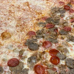 Half triboro and half plain pizza