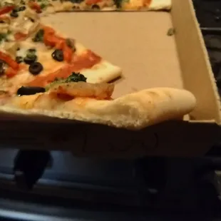  slice taken out of a pizza box