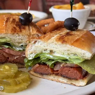 Italian Hot Smokey sandwich - Italian sausage (with a spicy kick) on a toasted French roll with (extra) lettuce and tomatoes! Delicious!